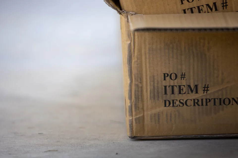Corner of a packed cardboard shipping box
